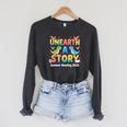 Summer Reading Unearth A Story Dinosaur Books 2026 Raglan Sleeve Sweatshirt Dark Grey Heather Summer Reading Unearth A Story Dinosaur Books 2026 Raglan Sleeve Sweatshirt Dark Grey Heather