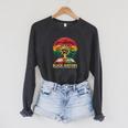 History Inspiring Future Fist Tree Book Roots Raglan Sleeve Sweatshirt Dark Grey Heather