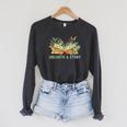 Unearth a Story Dinosaur 2026 Summer Reading Program Book Raglan Sleeve Sweatshirt Dark Grey Heather Unearth a Story Dinosaur 2026 Summer Reading Program Book Raglan Sleeve Sweatshirt Dark Grey Heather