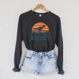 Unearth A Story Dinosaur Reader Book Lover 2026 Raglan Sleeve Sweatshirt Dark Grey Heather