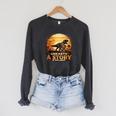 Unearth Story Summer Reading 2026 Dinosaurs Library Reading Raglan Sleeve Sweatshirt Dark Grey Heather