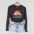 Unearth a Story Summer Reading 2026 Vintage Book Rainbow Raglan Sleeve Sweatshirt Dark Grey Heather Unearth a Story Summer Reading 2026 Vintage Book Rainbow Raglan Sleeve Sweatshirt Dark Grey Heather