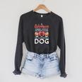 A Woman Cannot Survive On Books Alone She Also Needs a Dog Raglan Sleeve Sweatshirt Dark Grey Heather