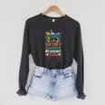 Women's Unearth A Story Summer Reading Program 2026 Dinosaur Book Raglan Sleeve Sweatshirt Dark Grey Heather