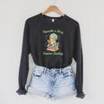 Women's Unearth a Story Triceratops Dinosaur Reading Books Cute Dino Raglan Sleeve Sweatshirt Dark Grey Heather