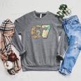 67 Book Stack Literary Adventure Reader Raglan Sleeve Sweatshirt Deep Heather