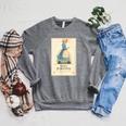 American Girl Meet Kirsten Book Cover Raglan Sleeve Sweatshirt Deep Heather American Girl Meet Kirsten Book Cover Raglan Sleeve Sweatshirt Deep Heather
