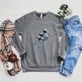 Astronaut Reading Book Sci-Fi Enthusiast Raglan Sleeve Sweatshirt Deep Heather