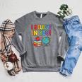 I Believe In You Educational Art With Books And Globe Raglan Sleeve Sweatshirt Deep Heather