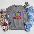 THE BEST TEACHERS TEACH FROM THE HEART NOT BOOK T-SHIRT Men Women Raglan Sleeve Sweatshirt Deep Heather THE BEST TEACHERS TEACH FROM THE HEART NOT BOOK T-SHIRT Men Women Raglan Sleeve Sweatshirt Deep Heather