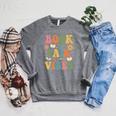 Book Fair Vibes Groovy Retro School Reading Nostalgic Raglan Sleeve Sweatshirt Deep Heather