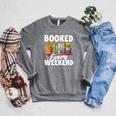 Booked Every Weekend Pun Book Lover Book Nerd Reading Premium Tri-Blend Raglan Sleeve Sweatshirt Deep Heather