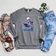 Bookish Skeleton Reading In Wildflowers Book Lover Bookworm Raglan Sleeve Sweatshirt Deep Heather