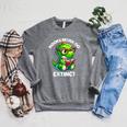 Books Never Go Extinct Reading Dinosaur Bookish Nerdy Raglan Sleeve Sweatshirt Deep Heather