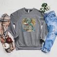 Bookworm Dragons Reading Book Dragons And Books Raglan Sleeve Sweatshirt Deep Heather