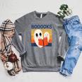 Cute Ghost Book Reading Halloween Teacher Puns Booooks Men Women Kids Raglan Sleeve Sweatshirt Deep Heather