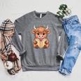 Cute Highland Cow Reading Book Raglan Sleeve Sweatshirt Deep Heather