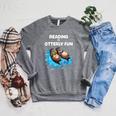 Cute Otter Reading Book Two Otter Reading Is Otterly Fun Raglan Sleeve Sweatshirt Deep Heather Cute Otter Reading Book Two Otter Reading Is Otterly Fun Raglan Sleeve Sweatshirt Deep Heather