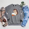 Cute Wildlife Forest Animal Bookworm Book Reading Hedgehog Raglan Sleeve Sweatshirt Deep Heather