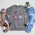 DC Comics Harley Quinn With Textbook Collage Raglan Sleeve Sweatshirt Deep Heather DC Comics Harley Quinn With Textbook Collage Raglan Sleeve Sweatshirt Deep Heather