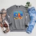 Dive Into a Good Book Reading Pun Raglan Sleeve Sweatshirt Deep Heather