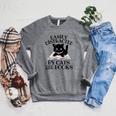 Easily Distracted By Cats And Books Cat Book Lover Raglan Sleeve Sweatshirt Deep Heather