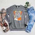 I Fall For Pumpkins Bonfires S'Mores Books Halloween Reader Raglan Sleeve Sweatshirt Deep Heather