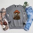 Floral Mushroom Skeleton Reading Books Gothic Humor Raglan Sleeve Sweatshirt Deep Heather