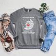 Good Book Is Out Of This World Astronaut Moon Space Bookworm Raglan Sleeve Sweatshirt Deep Heather