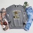 Good Girls Read Bad Books Vintage Skeleton Reader Raglan Sleeve Sweatshirt Deep Heather