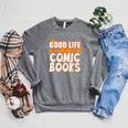 A Good Life Is A Collection Of Comic Books Graphic Vintage Raglan Sleeve Sweatshirt Deep Heather