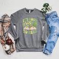 Groovy It's Good Luck To Read St Patrick's Day Book Lucky Raglan Sleeve Sweatshirt Deep Heather