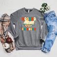 Hooked On Books Retro Reader Raglan Sleeve Sweatshirt Deep Heather Hooked On Books Retro Reader Raglan Sleeve Sweatshirt Deep Heather