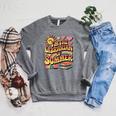 I'm The Librarian Of Summer Groovy Rainbow Retro Book Lover Raglan Sleeve Sweatshirt Deep Heather
