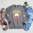 Never Judge A Book By It's Movie Reading Raglan Sleeve Sweatshirt Deep Heather