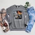 Just One More Chapter Dumpster Raccoon Reading Book Raglan Sleeve Sweatshirt Deep Heather