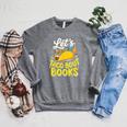 Let's Taco About Books Mexican Pun Bookworm Raglan Sleeve Sweatshirt Deep Heather