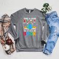 Take A Look It's In A Book Reading Vintage Retro Rainbow Raglan Sleeve Sweatshirt Deep Heather
