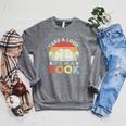 Take A Look It's In A Book Retro Reading Premium Tri-Blend Raglan Sleeve Sweatshirt Deep Heather