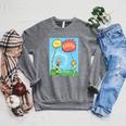 The Lorax Book Cover Performance Raglan Sleeve Sweatshirt Deep Heather The Lorax Book Cover Performance Raglan Sleeve Sweatshirt Deep Heather
