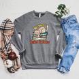 All I Need Is Books And Cats Book Lover Cat Lover Raglan Sleeve Sweatshirt Deep Heather