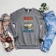 Patriotic Red & Read 4th Of July Book Lover Librarian Raglan Sleeve Sweatshirt Deep Heather