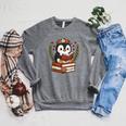 Penguin Reading Book Graphic Penguin With Book Floral Raglan Sleeve Sweatshirt Deep Heather