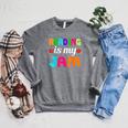 Reading Is My Jam Bookworm Books Teacher Bibliophile Men Women Kids Raglan Sleeve Sweatshirt Deep Heather