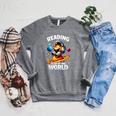 Reading Is Out Of This World Astronaut Book Lover Teacher Raglan Sleeve Sweatshirt Deep Heather Reading Is Out Of This World Astronaut Book Lover Teacher Raglan Sleeve Sweatshirt Deep Heather