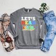 Retro Reading Teacher Book Lover Let's Read Raglan Sleeve Sweatshirt Deep Heather