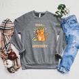 Shhh I'm Solving A Mystery Cat Detective Book Lover Raglan Sleeve Sweatshirt Deep Heather