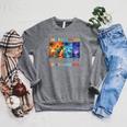Summer Reading 2026 Unearth A Story Dinosaur Books Raglan Sleeve Sweatshirt Deep Heather Summer Reading 2026 Unearth A Story Dinosaur Books Raglan Sleeve Sweatshirt Deep Heather