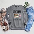 Never Underestimate An Old Lady Who Loves Books And Wine Raglan Sleeve Sweatshirt Deep Heather Never Underestimate An Old Lady Who Loves Books And Wine Raglan Sleeve Sweatshirt Deep Heather