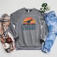 Unearth A Story Dinosaur Reader Book Lover 2026 Raglan Sleeve Sweatshirt Deep Heather